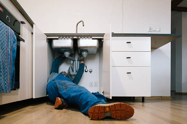 Professional Drain Cleaning technician working in Wellborn, TX